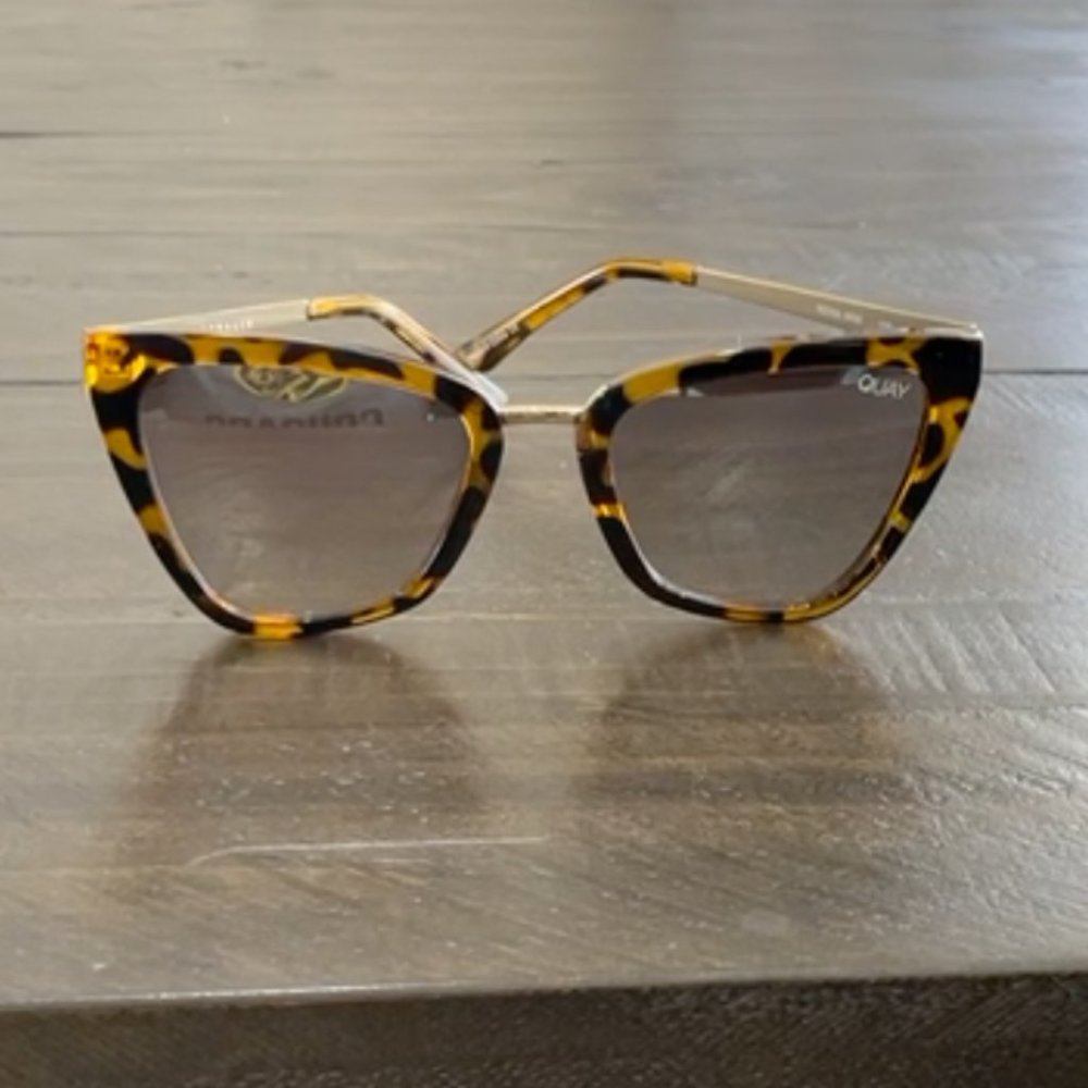 Quay Reina Cat Eye Sunglasses in Brown.